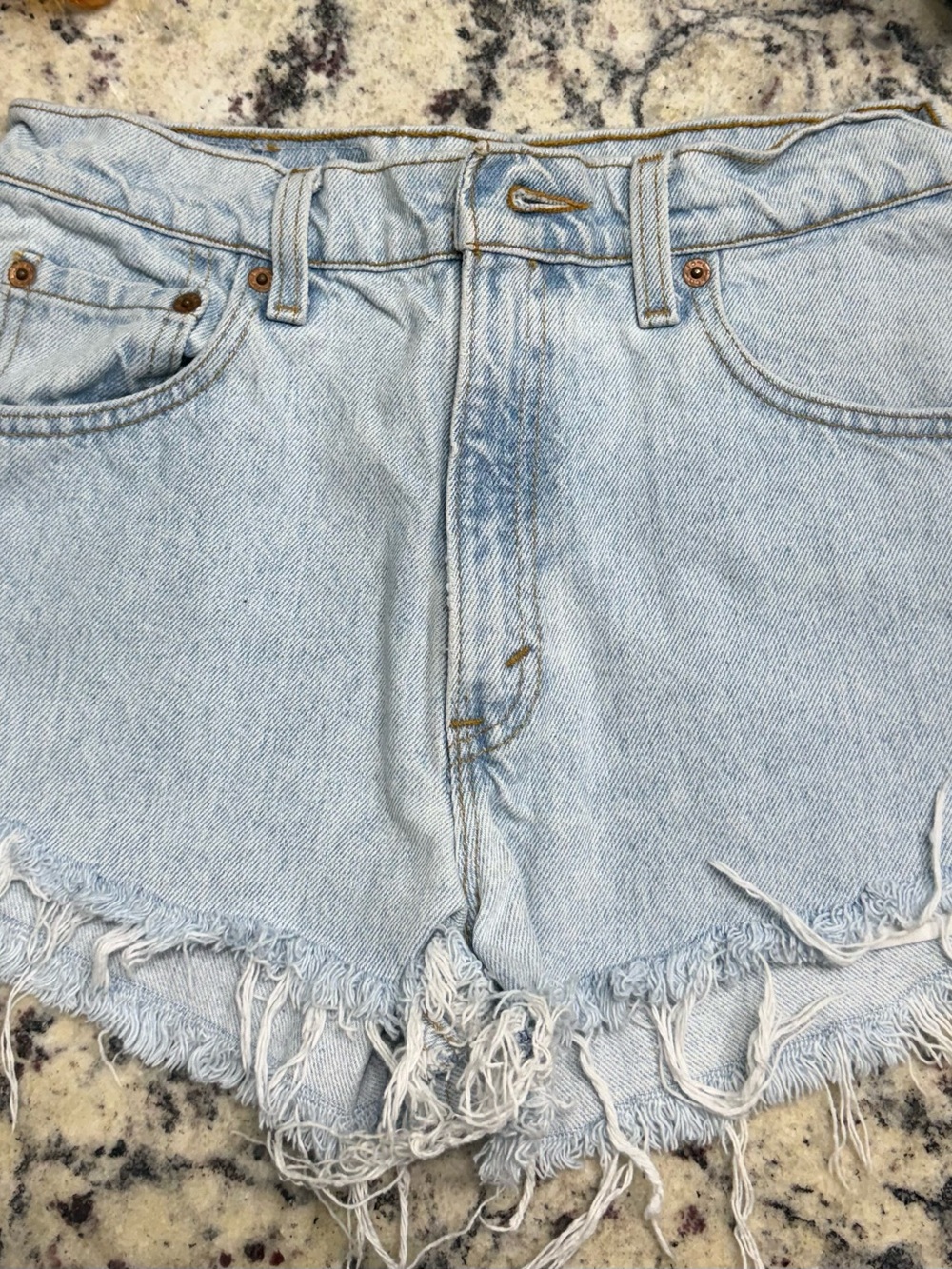 Vintage Levi's Light Blue Frayed Hem Denim Shorts